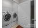 Convenient laundry room with washer and dryer included at 254 Streamside Pl, Mooresville, NC 28115