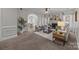 Spacious living room featuring a fireplace and access to dining area at 254 Streamside Pl, Mooresville, NC 28115