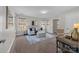 Home office with a comfortable sofa and work area at 254 Streamside Pl, Mooresville, NC 28115