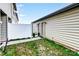 View of backyard with privacy fence, and side entrance to the home at 3033 Honeylocust Ln, Fort Mill, SC 29707