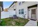 Small grassy backyard with white privacy fence at 3033 Honeylocust Ln, Fort Mill, SC 29707