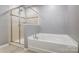 Bathroom with soaking tub and separate walk-in shower at 3033 Honeylocust Ln, Fort Mill, SC 29707