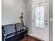 Small entryway with bench and door leading into the home at 3033 Honeylocust Ln, Fort Mill, SC 29707