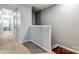 Upper hallway with carpeted floor and access to bedrooms at 3033 Honeylocust Ln, Fort Mill, SC 29707
