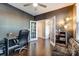 Home office features desk, chair, and French doors leading to hallway at 3033 Honeylocust Ln, Fort Mill, SC 29707