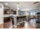 Open kitchen with island, granite counters, and stainless steel appliances at 3033 Honeylocust Ln, Fort Mill, SC 29707