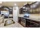 Open kitchen with island, granite counters, and stainless steel appliances at 3033 Honeylocust Ln, Fort Mill, SC 29707