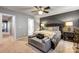 Main bedroom with ensuite bathroom access and a comfortable sitting area at 3033 Honeylocust Ln, Fort Mill, SC 29707