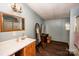 Bathroom with a vanity, mirror, and tub/shower combo at 338 Piney Grove Rd, Harmony, NC 28634