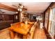 Spacious dining area with a large wooden table at 338 Piney Grove Rd, Harmony, NC 28634