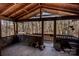 Spacious screened porch with wooded views at 338 Piney Grove Rd, Harmony, NC 28634