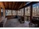 Screened porch overlooking the woods at 338 Piney Grove Rd, Harmony, NC 28634