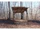 Simple wooden shelter in the woods at 338 Piney Grove Rd, Harmony, NC 28634