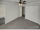 Bedroom with carpet, ceiling fan and double closet at 4210 Manchester Ln, Monroe, NC 28110