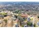 An aerial view showing the location of the property among the trees and other homes in the community at 502 Rhyne Cir, Gastonia, NC 28054