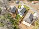 Aerial view of the property showcasing the house, yard, fencing, and its positioning in the neighborhood at 502 Rhyne Cir, Gastonia, NC 28054