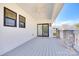 Large back porch featuring a ceiling fan, stylish railings, and outdoor space at 502 Rhyne Cir, Gastonia, NC 28054