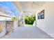 Relaxing back porch area, perfect for outdoor seating, offering a peaceful view of the backyard at 502 Rhyne Cir, Gastonia, NC 28054