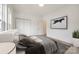 Bright, modern bedroom with hardwood floors, ample closet space, and neutral colors for a calming retreat at 502 Rhyne Cir, Gastonia, NC 28054