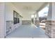 Inviting covered front porch with stone accents and plenty of space for relaxing at 502 Rhyne Cir, Gastonia, NC 28054