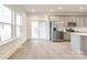 Open-concept kitchen with stainless steel appliances and plenty of natural light at 502 Rhyne Cir, Gastonia, NC 28054
