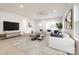Bright, stylish living room with hardwood floors, modern furniture, and neutral decor, perfect for relaxing or entertaining at 502 Rhyne Cir, Gastonia, NC 28054