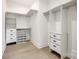 Spacious walk-in closet with custom shelving and ample storage, providing organized space for clothing and accessories at 502 Rhyne Cir, Gastonia, NC 28054