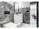 Stylish bathroom with gray marble tile and white vanity at 516 Spring Garden Ave, Kannapolis, NC 28081