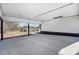 Covered carport with concrete flooring and backyard view at 516 Spring Garden Ave, Kannapolis, NC 28081