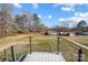 Modern deck with cable railing offering backyard view at 516 Spring Garden Ave, Kannapolis, NC 28081