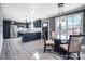 Modern dining area with glass table and chairs near kitchen at 516 Spring Garden Ave, Kannapolis, NC 28081