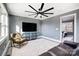 Spacious living room with large TV and comfy seating at 516 Spring Garden Ave, Kannapolis, NC 28081