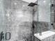 Modern shower with gray marble tile and glass enclosure at 516 Spring Garden Ave, Kannapolis, NC 28081