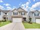 Two-story house with a two-car garage and landscaped lawn at 6539 Gopher Rd, Indian Land, SC 29707