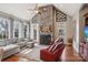 Living area with a large stone fireplace and hardwood floors at 6639 Fox Ridge Cir, Davidson, NC 28036