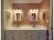 Bathroom with double vanity and mirrors at 7169 Pleasant Grove Rd, Charlotte, NC 28216