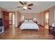 Bright bedroom with hardwood floors and double bed at 7169 Pleasant Grove Rd, Charlotte, NC 28216