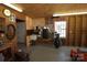Spacious garage interior with workbench, sink, and ample storage, suitable for hobbies at 7169 Pleasant Grove Rd, Charlotte, NC 28216