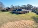 Brick ranch house with a large yard at 7169 Pleasant Grove Rd, Charlotte, NC 28216