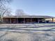 Large covered parking area for multiple vehicles or equipment at 7169 Pleasant Grove Rd, Charlotte, NC 28216