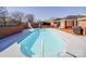 Sparkling pool with a slide and a well-maintained concrete surround at 7169 Pleasant Grove Rd, Charlotte, NC 28216