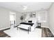 Main bedroom with en-suite bathroom and stylish decor at 1061 Fairway Ridge Rd, Concord, NC 28027