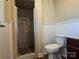 Small bathroom with shower and white toilet at 1103 Sunset Dr, Kannapolis, NC 28081