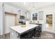 Modern kitchen with gray cabinets, white countertops, and a kitchen island at 11121 Argosy Dr # 1081, Lancaster, SC 29720