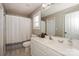 Clean bathroom with a white vanity and shower at 11231 Heritage Green Dr, Cornelius, NC 28031