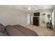 Large bedroom with a king bed and en-suite bathroom at 11231 Heritage Green Dr, Cornelius, NC 28031