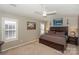 Spacious main bedroom with a large bed and plenty of natural light at 11231 Heritage Green Dr, Cornelius, NC 28031