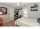 Bright bedroom with a desk and built-in shelving at 11231 Heritage Green Dr, Cornelius, NC 28031