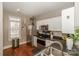 Modern kitchen with stainless steel appliances and wood floors at 11231 Heritage Green Dr, Cornelius, NC 28031