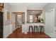 Open kitchen with breakfast bar and stainless steel appliances at 11231 Heritage Green Dr, Cornelius, NC 28031